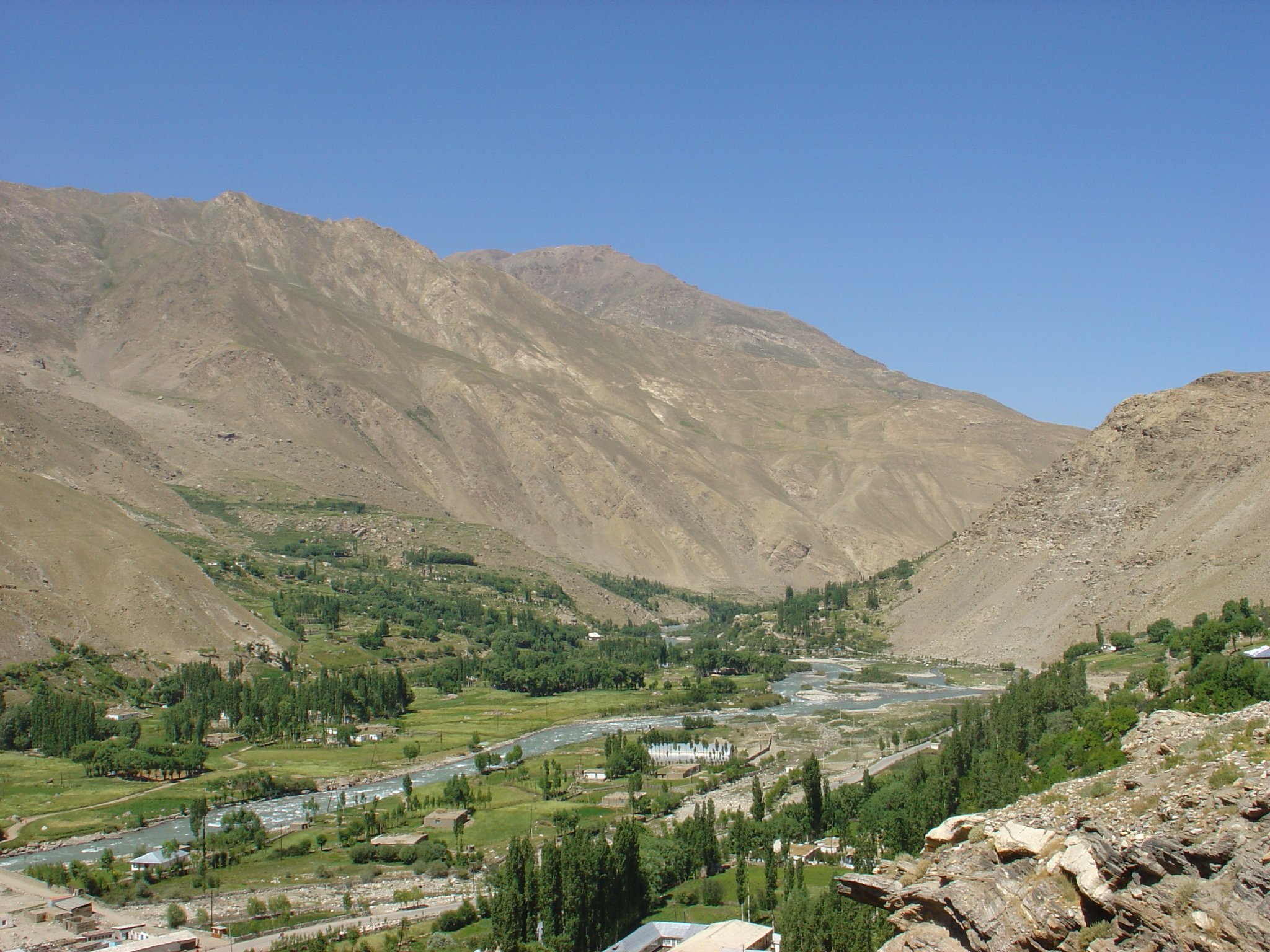 River in valley surrounded by mountains